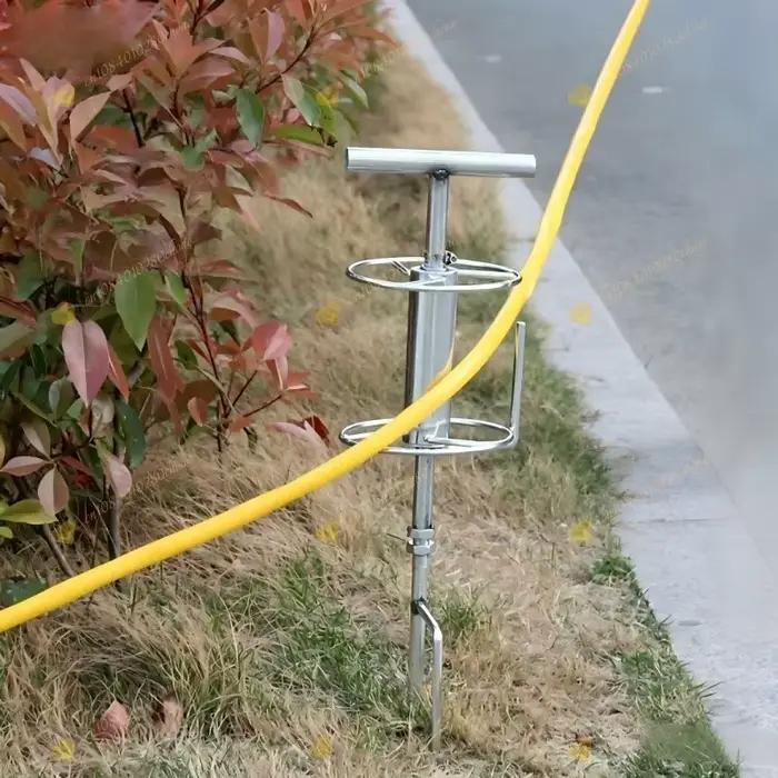 Dispositif de tirage et de rotation de tuyaux d'eau