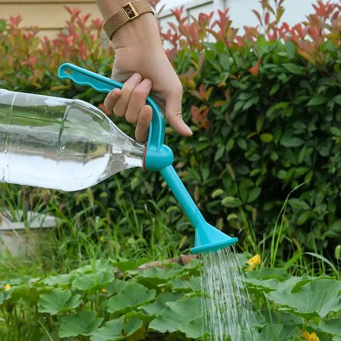 Bouteille d'arrosage manuelle double usage pour jardinage
