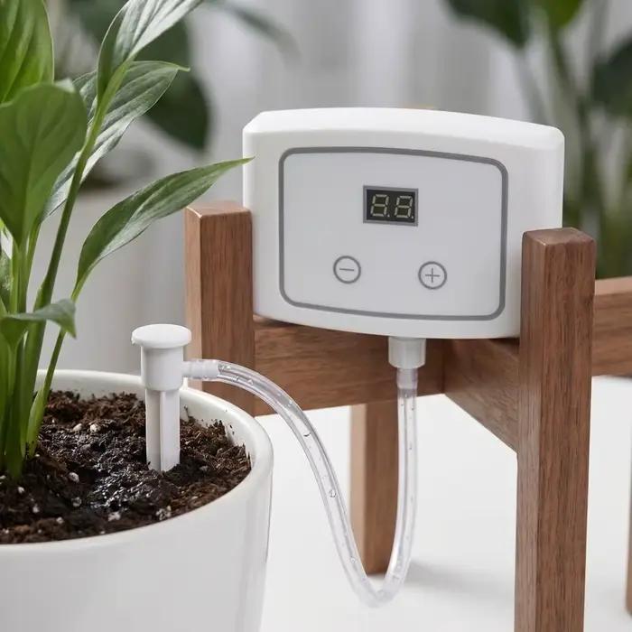 Dispositif d'arrosage automatique sensible à l'humidité