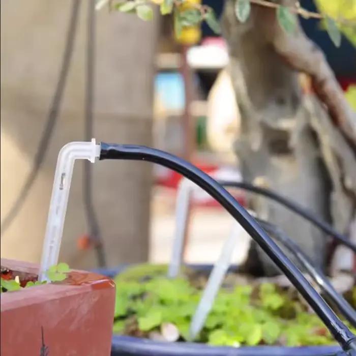 Goutteur de tuyau à courbure transparente
