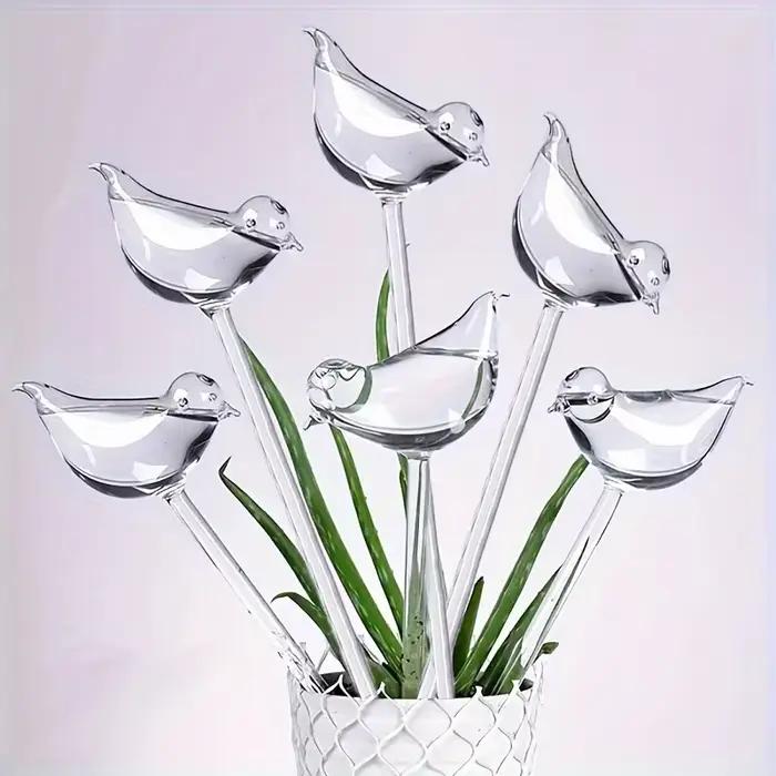 Dispositif d'arrosage automatique en forme d'oiseau pour plantes